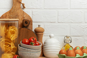 Italian food, cherry tomatoes, pasta, eggs and olive oil creatin, a Food & Drink Photo by Olena Rudo