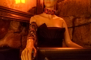 Cyberpunk mannequin seated in dark room at bar, a Beauty & Fashion Photo by DanFLCreativo