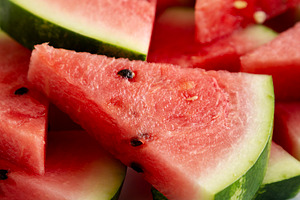 Raw Organic Watermelon Slices on a Plate, side view. Close-up., a Food & Drink Photo by LiudmylaChuhunova