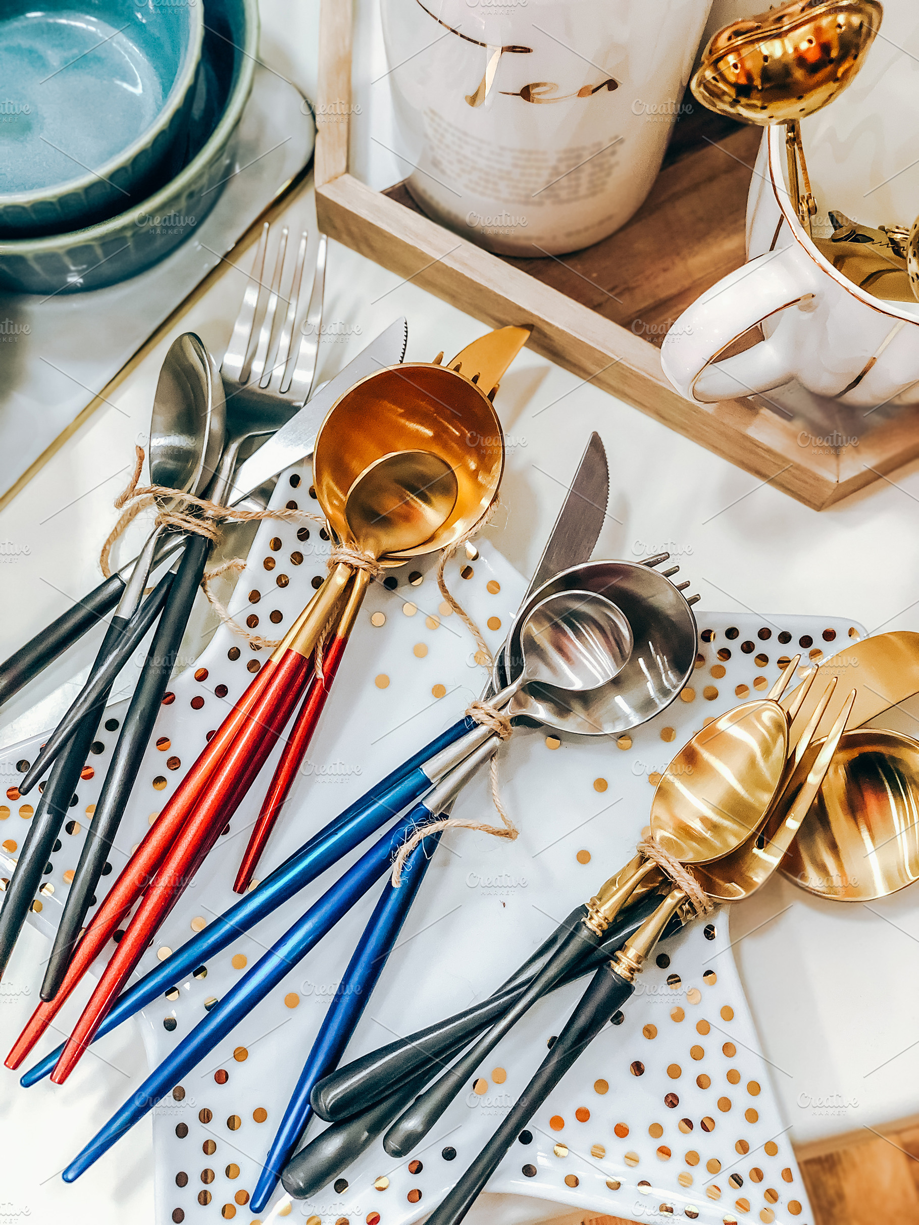 Colorful cutlery sets with wooden, a Photo by Dvoevnore photos