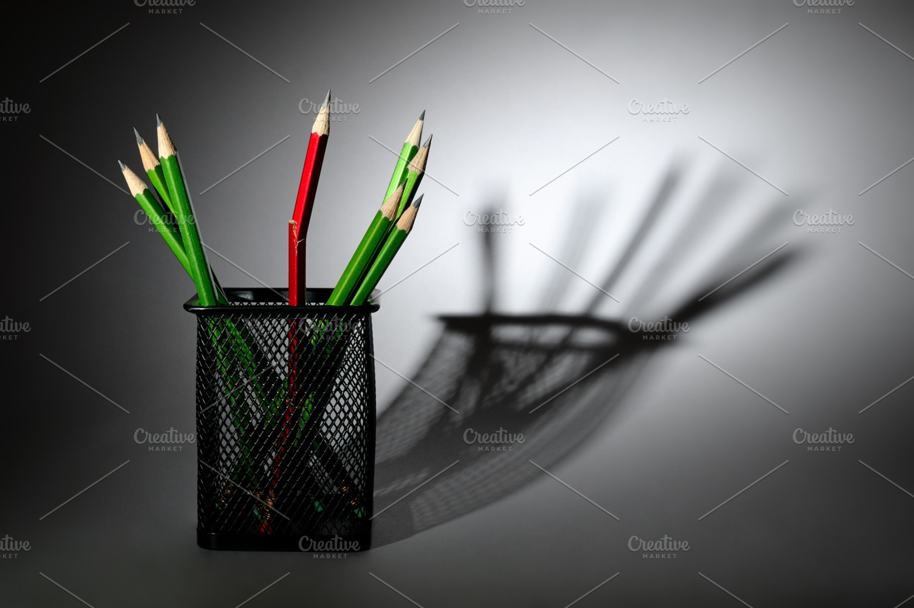 Broken Pencil And New Pencils In Cup