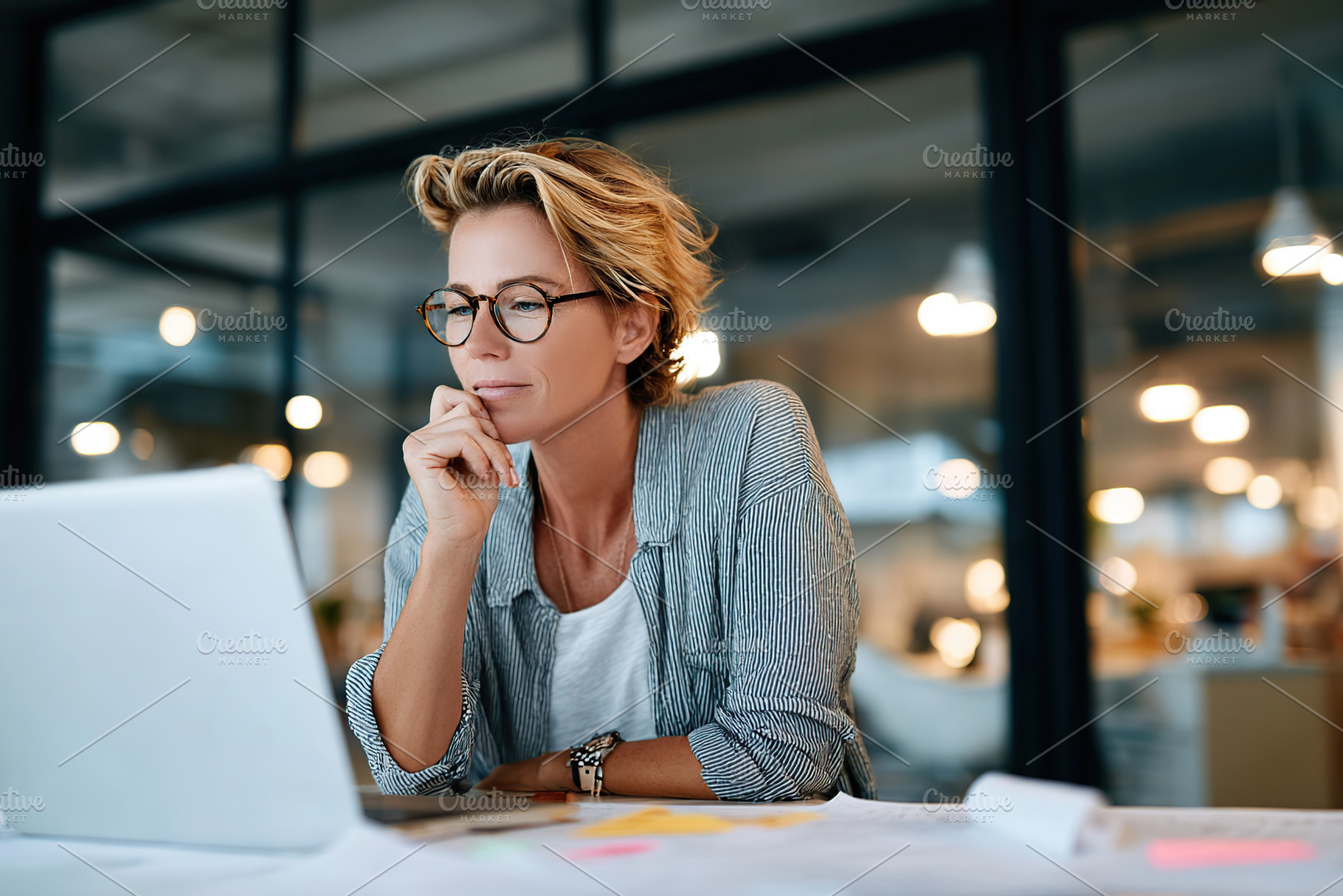 Architect focused on detailed BIM working intently in modern office environment, a Person Photo by AlyaAnd