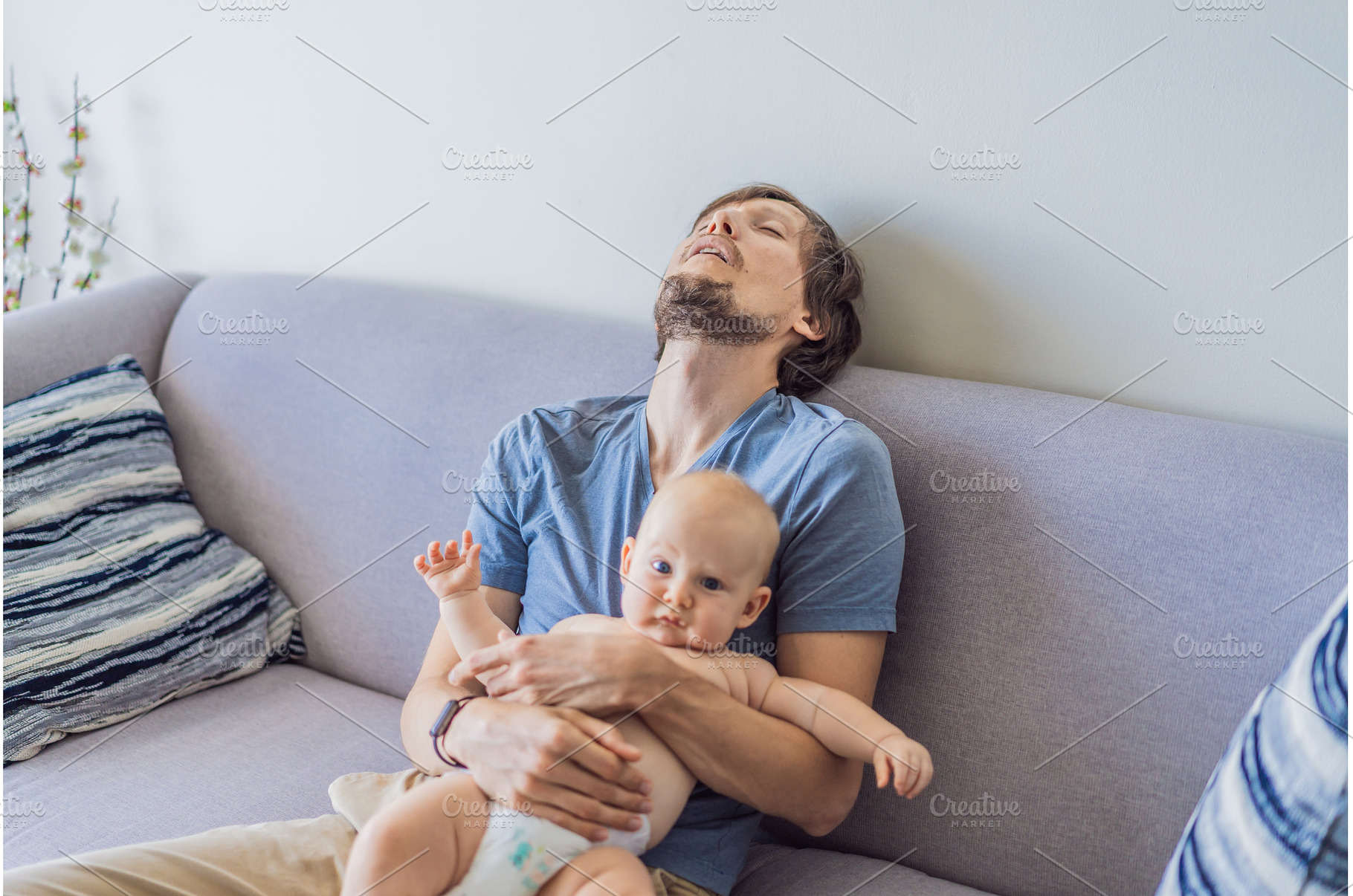 Tired father falling asleep on couch, a Person Photo by Elizaveta Galitskaya