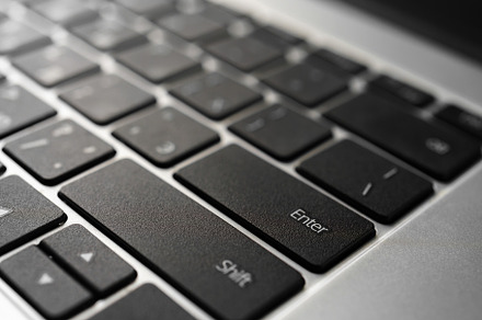Laptop keyboard with black keys and aluminum metal case., an Abstract Photo by Eugene_Photo