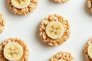Round rice cakes with creamy peanut, a Food & Drink Photo by MistyDay
