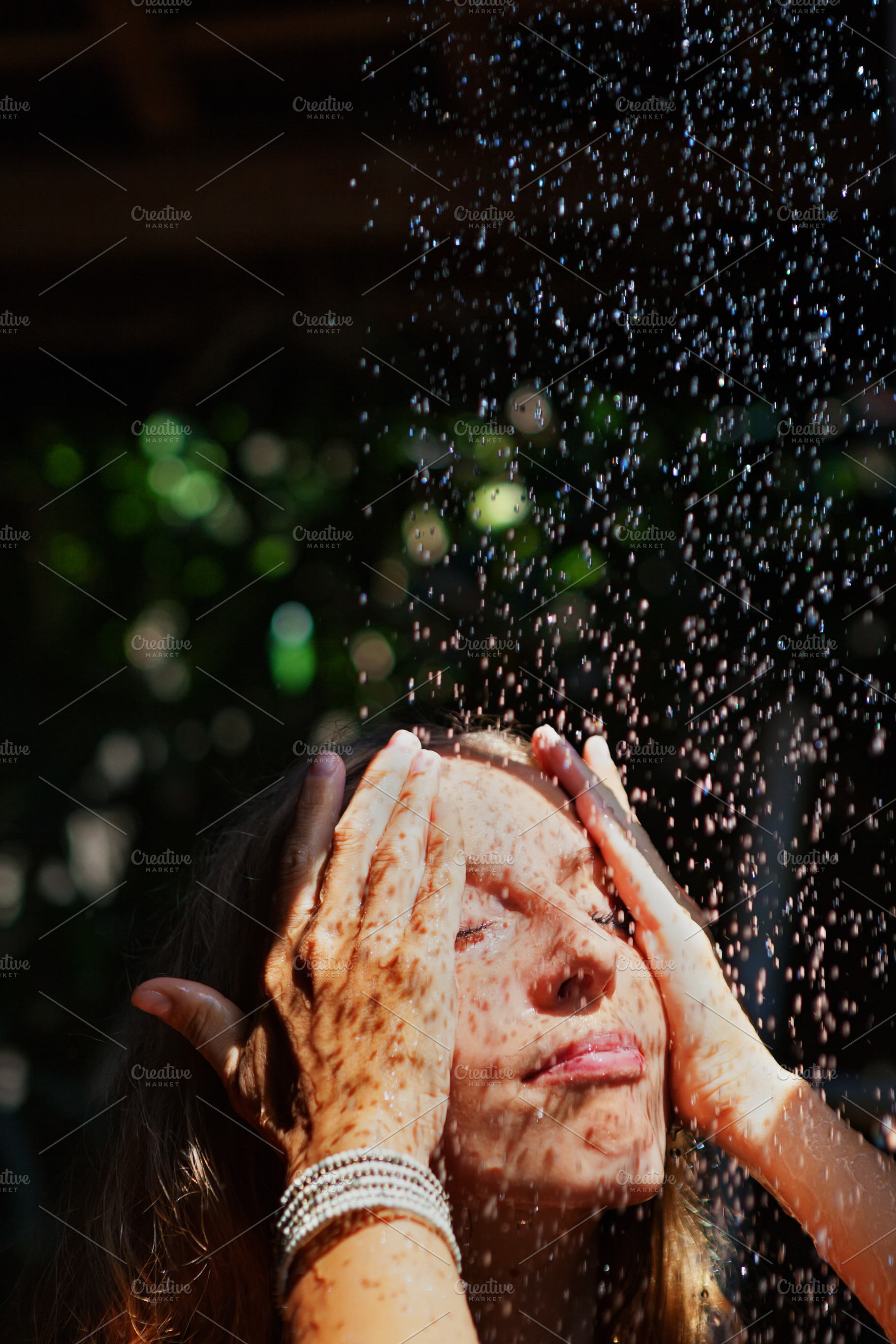 Woman stand under shower in outside, a Person Photo by Tropical Studio