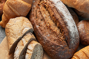 Freshly baked bread and pastries assortment for breakfast, a Food & Drink Photo by Olena Rudo