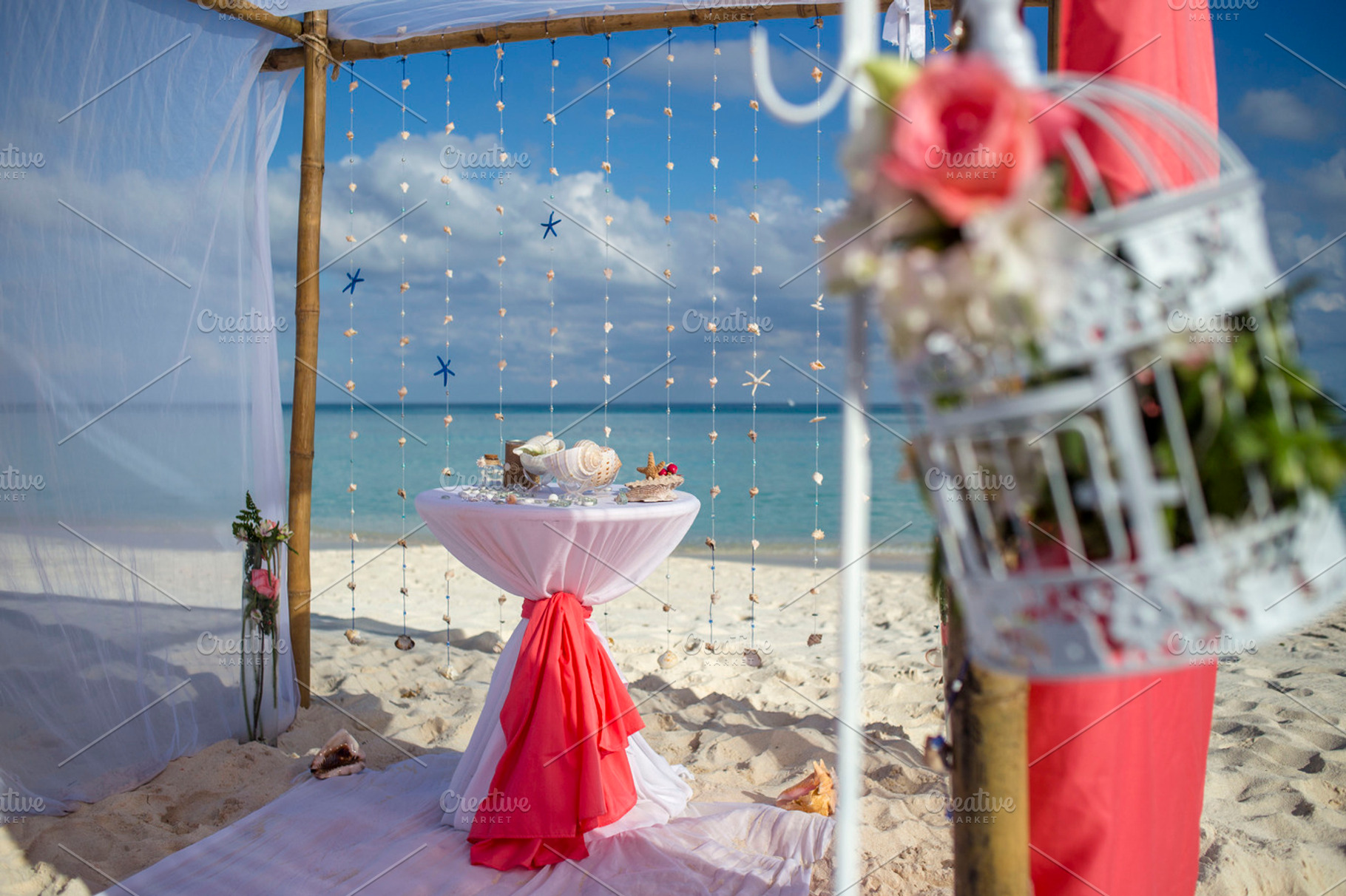 Beach wedding gazebo containing wedding, wedding decor, and beach wedding