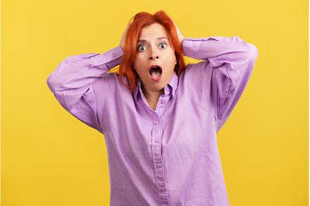 Surprised mature woman gesturing and, a Person Photo by Iván Moreno STOCK PHOTO