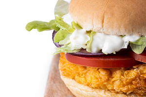 Closeup of crispy chicken burger, a Food & Drink Photo by etorres69