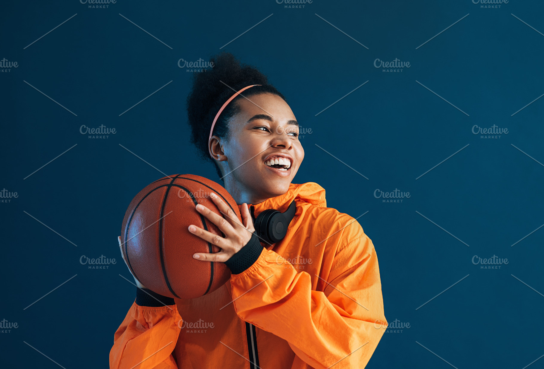 Happy professional basketball player, a Sports & Recreation Photo by Artem Varnitsin