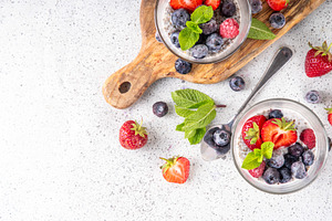 Chia seeds pudding dessert with fresh berries, a Food & Drink Photo by Rimma