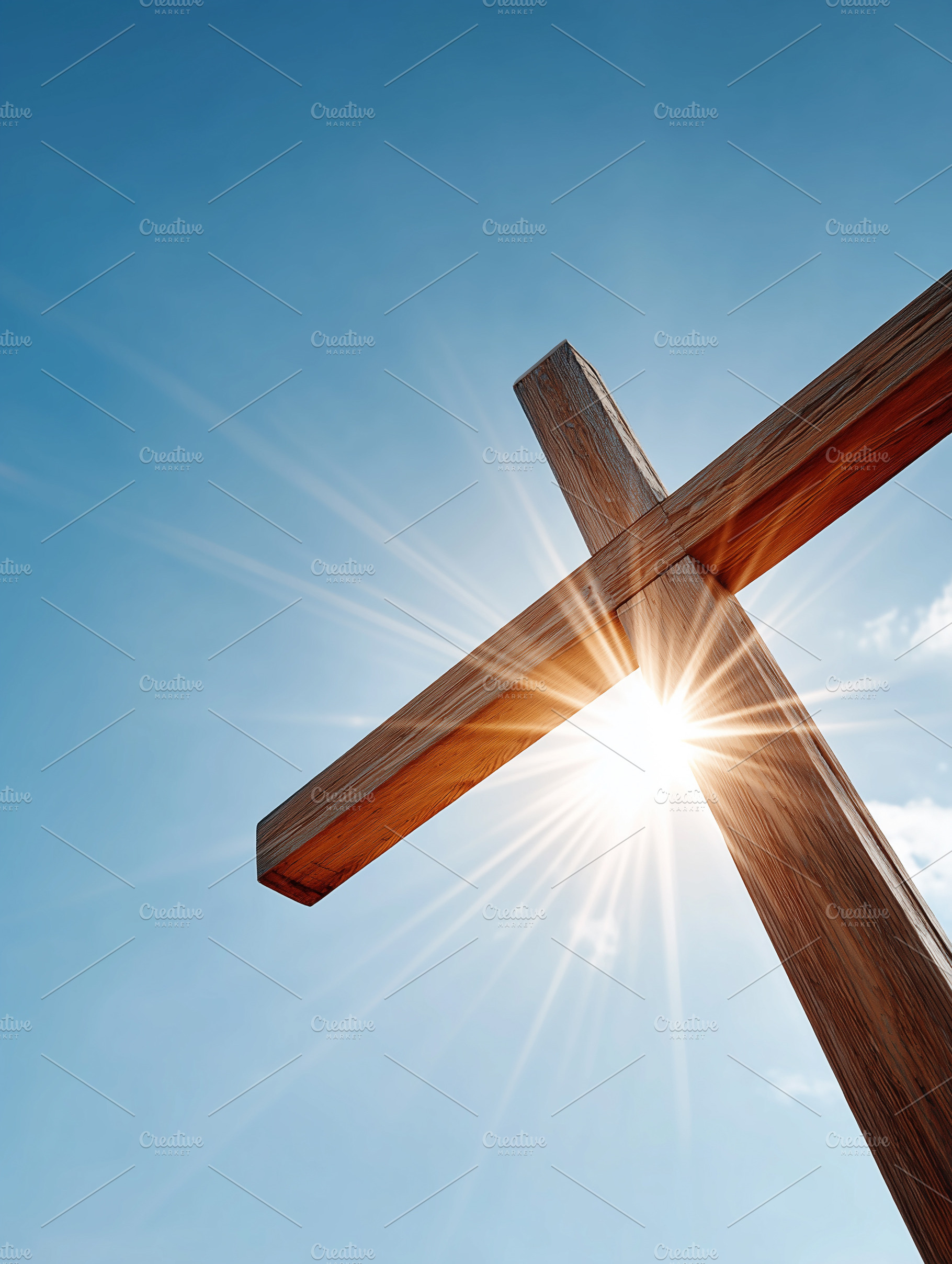 Sunlit wooden cross against a clear, a Holiday Photo by MistyDay