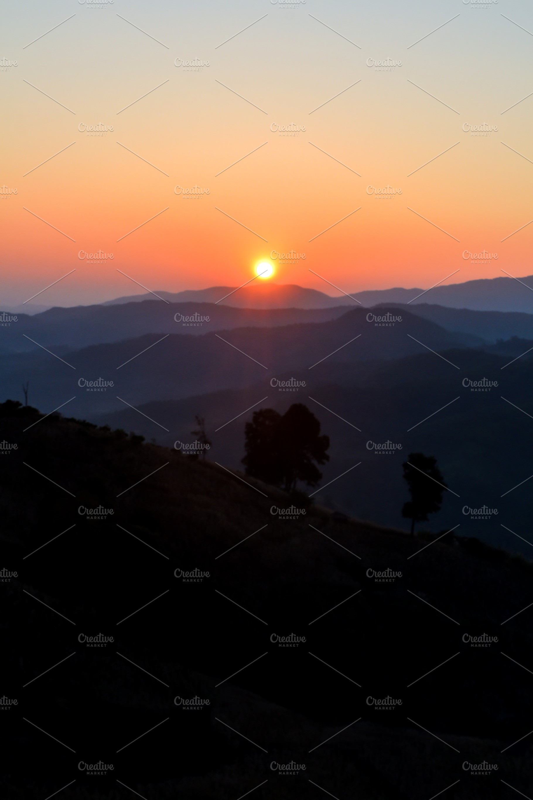 Sunrise on mountain containing autumn, background, and beautiful, a Nature Photo by Artmeesri
