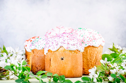 Easter cake and green and sweet eggs, white cherry flowers, fest, a Food & Drink Photo by 5PH