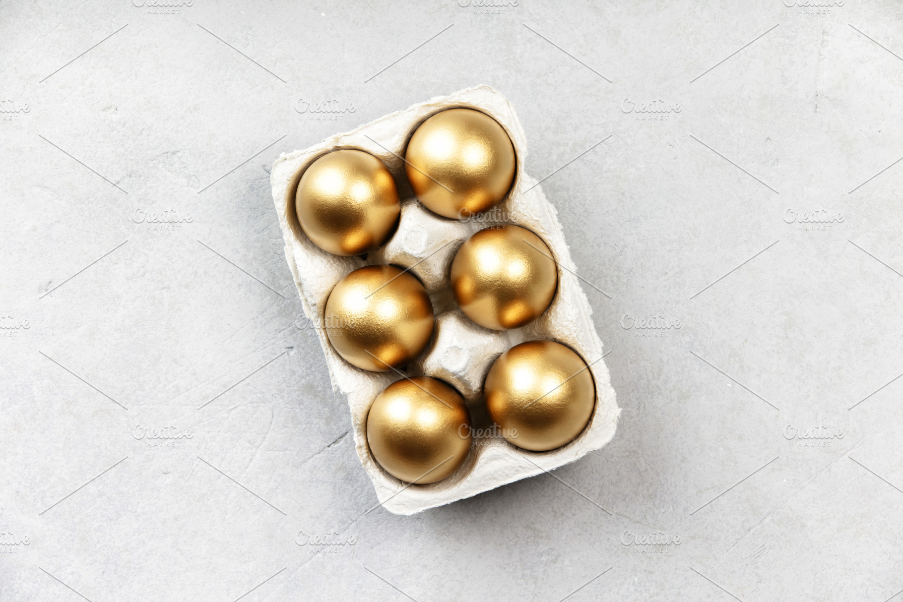 Golden Easter Eggs in Carton on Light Background, a Holiday Photo by Natalia Klenova's Shop