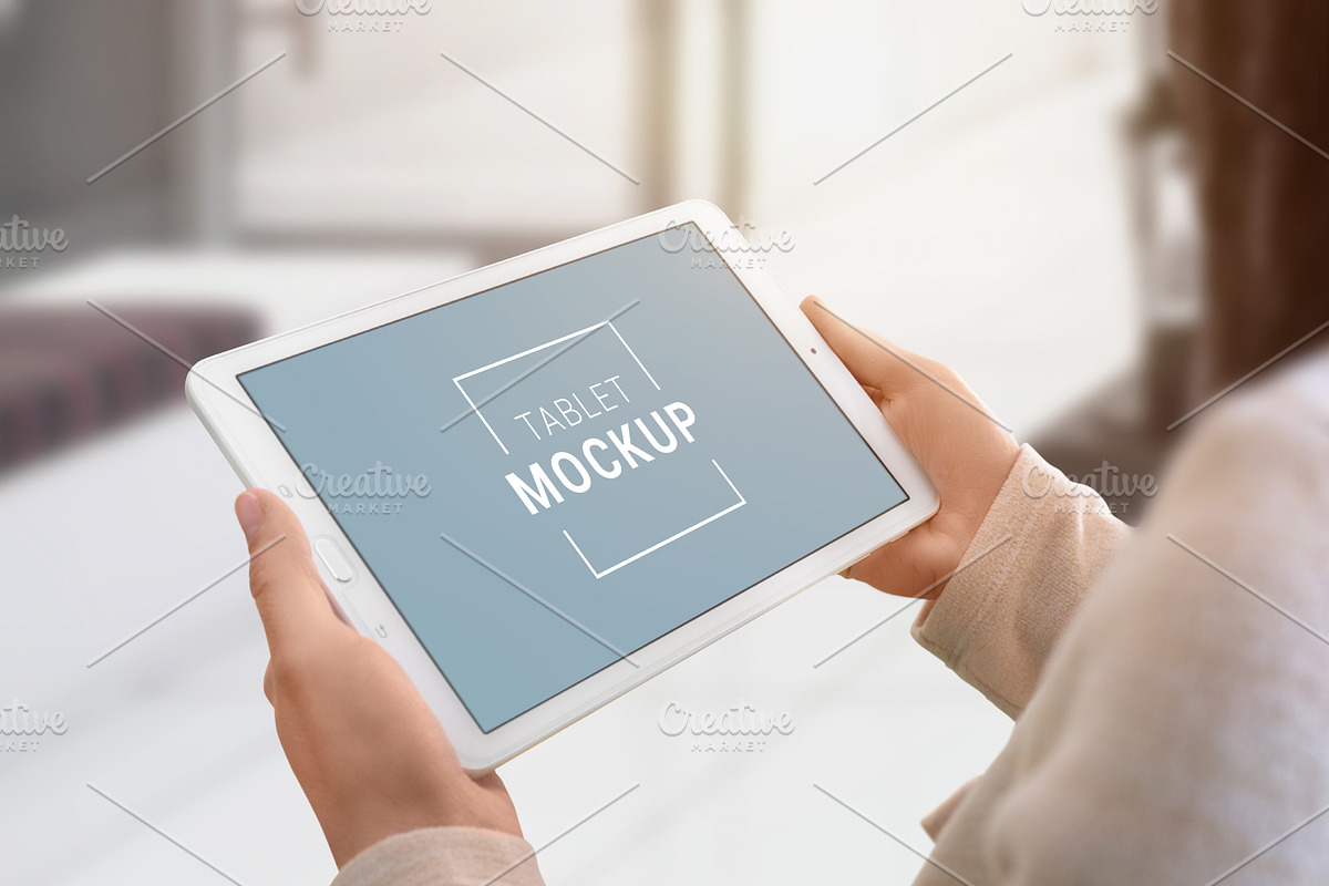 Tablet mockup in woman hands 1, an iPad Mockup by RSplaneta