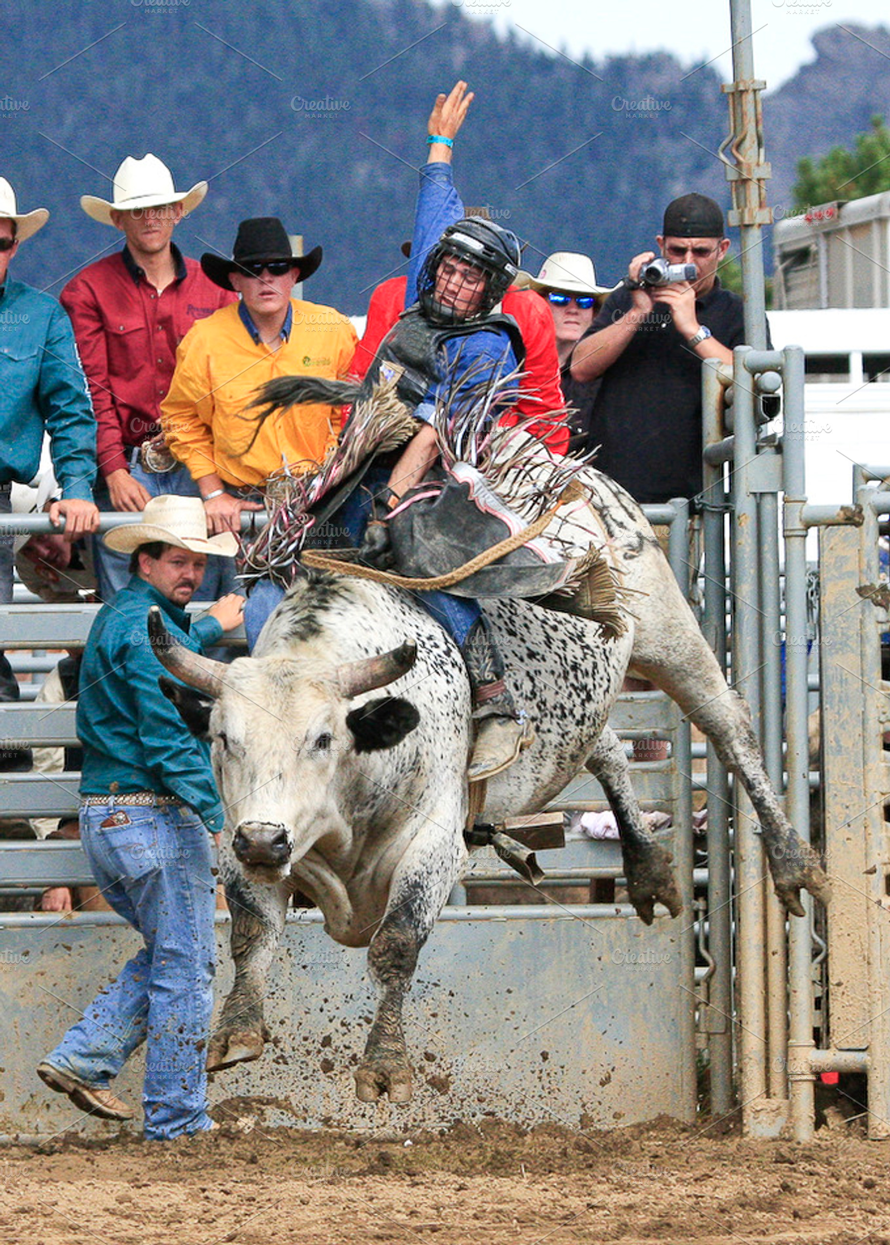 Bull riding containing bull, animal, and rodeo events, a Sports & Recreation Photo by RodeoPixels WesternImage