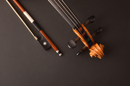 Peg box and neck of violin and bow on black, an Arts & Entertainment Photo by Davizro's Market