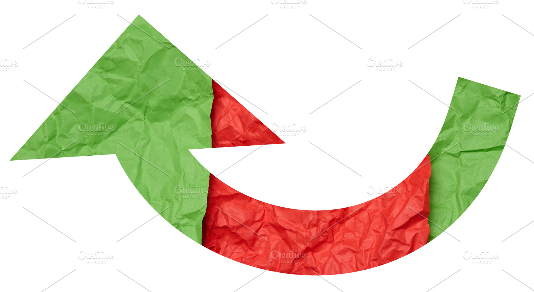 Two-color curved arrow, crumpled green and red paper, change and, an Abstract Photo by ndanko