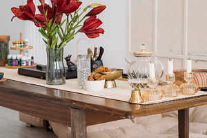 Dining room home atmosphere glass candles flower, a Background Photo by Photo Drive Studio
