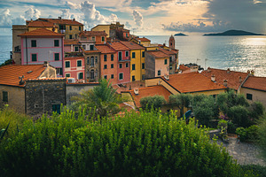 Tellaro view with colorful houses, an Architecture Photo by Alpine Dreams