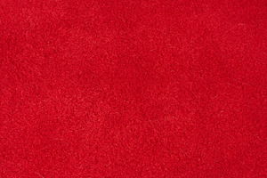 Close up of rich red suede showing the soft, shaggy surface text, an Abstract Photo by ndanko