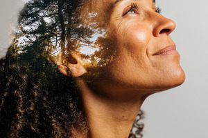 Double exposure portrait of a woman with nature, a Person Photo by AlyaAnd
