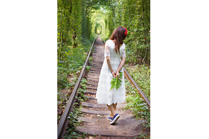 girl holding fern, tunnel of love, a Nature Photo by Artsaba Family