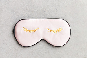 Sleep Mask with Embroidered Eyelashes on Minimal Background, a Health & Medical Photo by Natalia Klenova's Shop