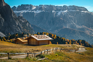 Wooden huts on the alpine pasture, a Nature Photo by Alpine Dreams