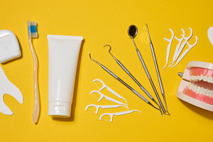 Oral hygiene set including dental floss in a case, toothbrush, t, a Health & Medical Photo by ndanko