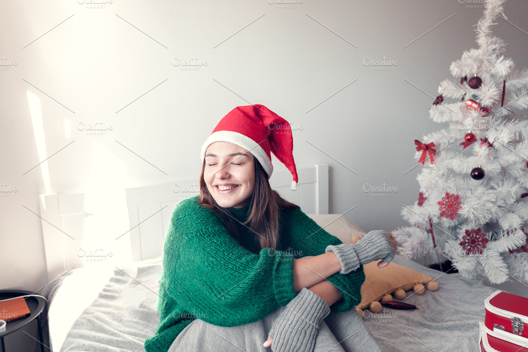 smiling girl wearing a Santa Claus h, a Holiday Photo by Eni_fly