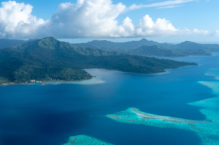 Aerial view of Tahaa island, French Polynesia, with turquoise la, a Nature Photo by GoodGoods