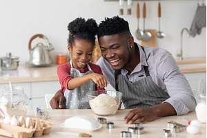 Joyful black father and daughter, a Person Photo by Prostock-Studio