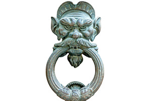 Ancient lion head doorknob isolated, an Architecture Photo by BOOCYS