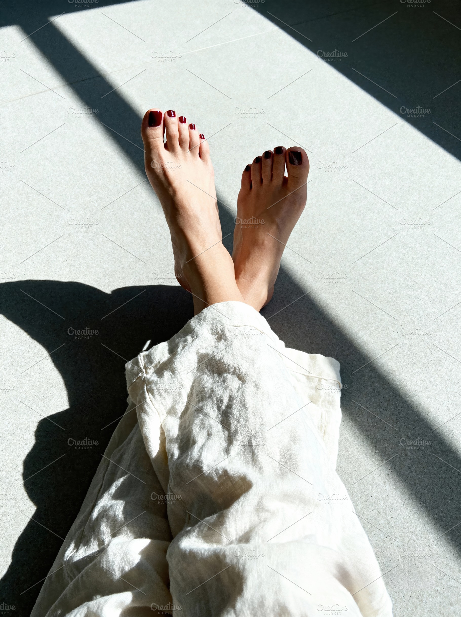 Minimalist Feet with Red Pedicure, a Beauty & Fashion Photo by Virgo Studio