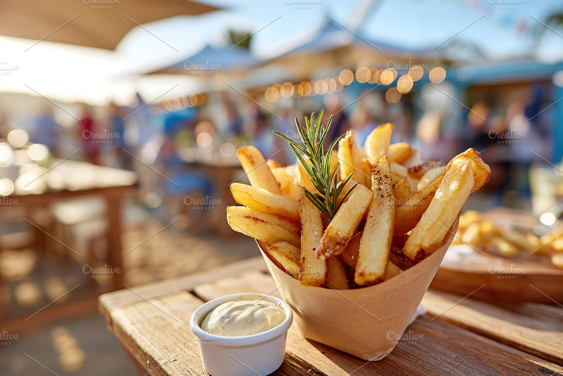 Crispy fries served in a paper cone at a beachside restaurant during golden hou, a Food & Drink Photo by AlyaAnd