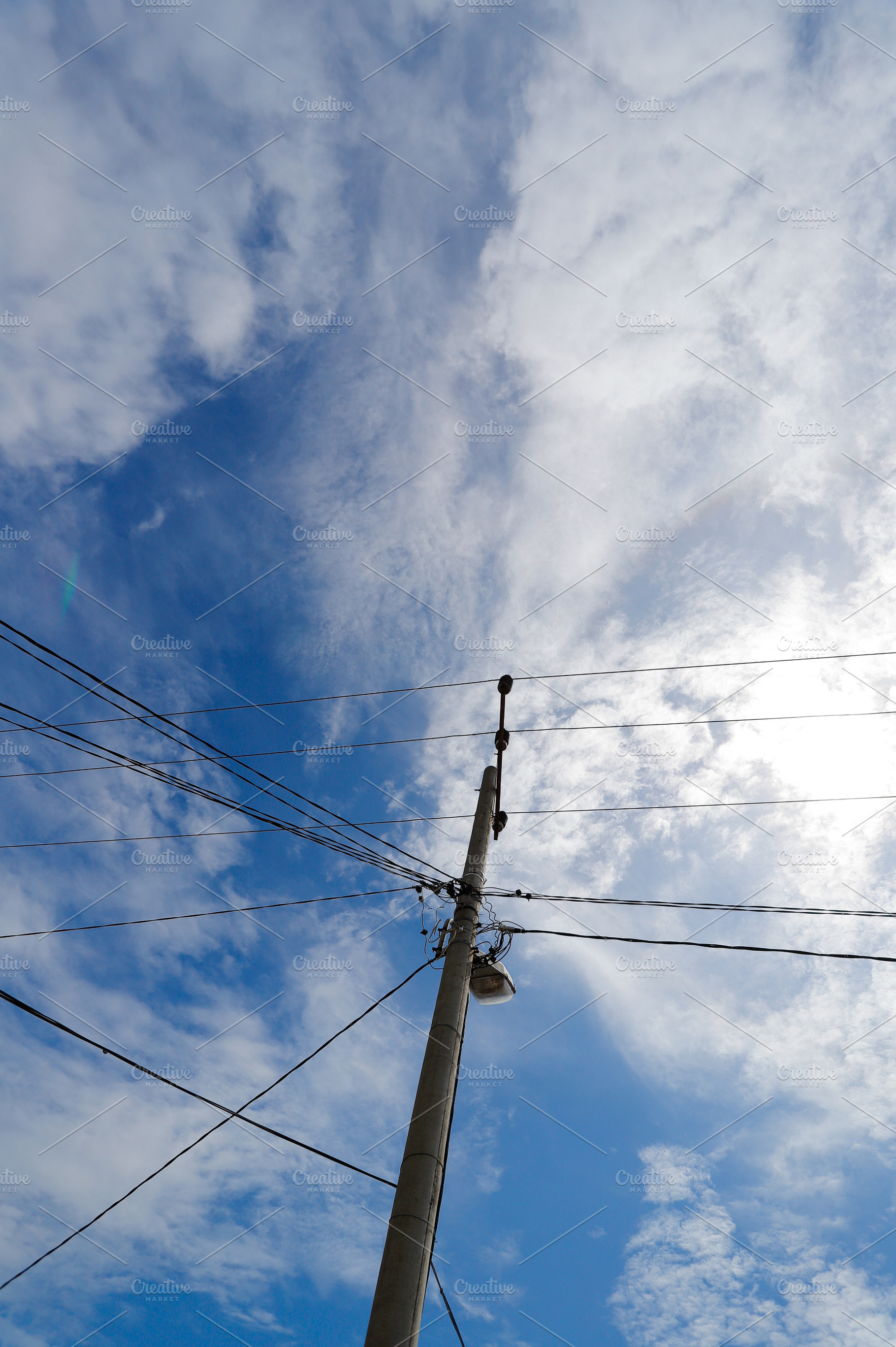 Electric Pole and Wires Against a Br, an Industrial Photo by bastera
