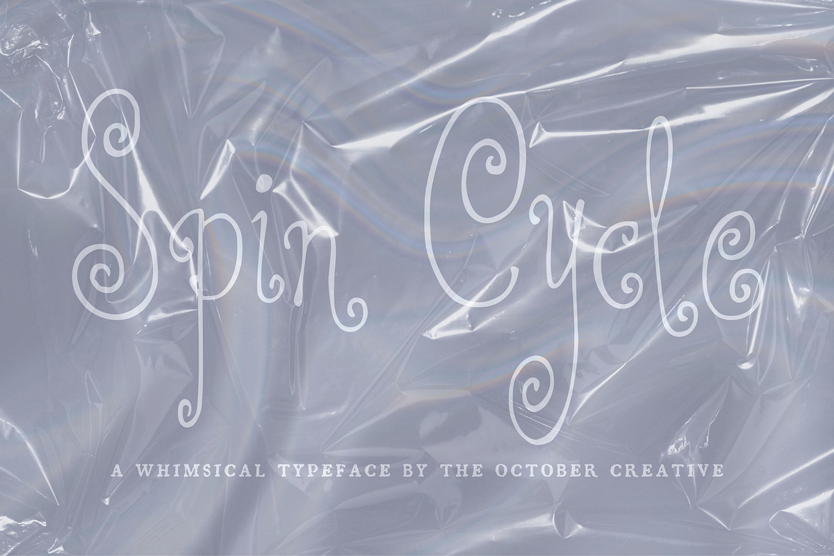 Spin Cycle Spiral Display Font, a Handwritten Font by The October Creative (Photo 1 of 8)