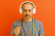 Man with headphones tangled in color, a Photo by Dvoevnore photos (Thumbnail 2 of 3)