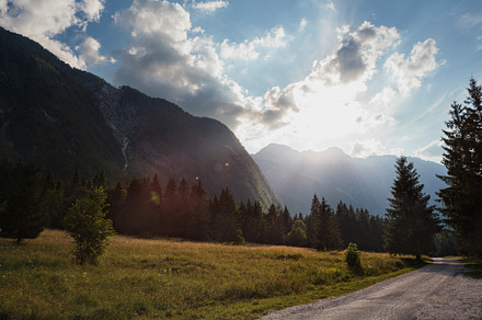 Sun rays or god rays over the Julian Alps in Slovenia, a Nature Photo by Bepslabor