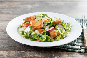 Fattoush salad, Traditional Lebanese Salad on wooden table, a Food & Drink Photo by etorres69