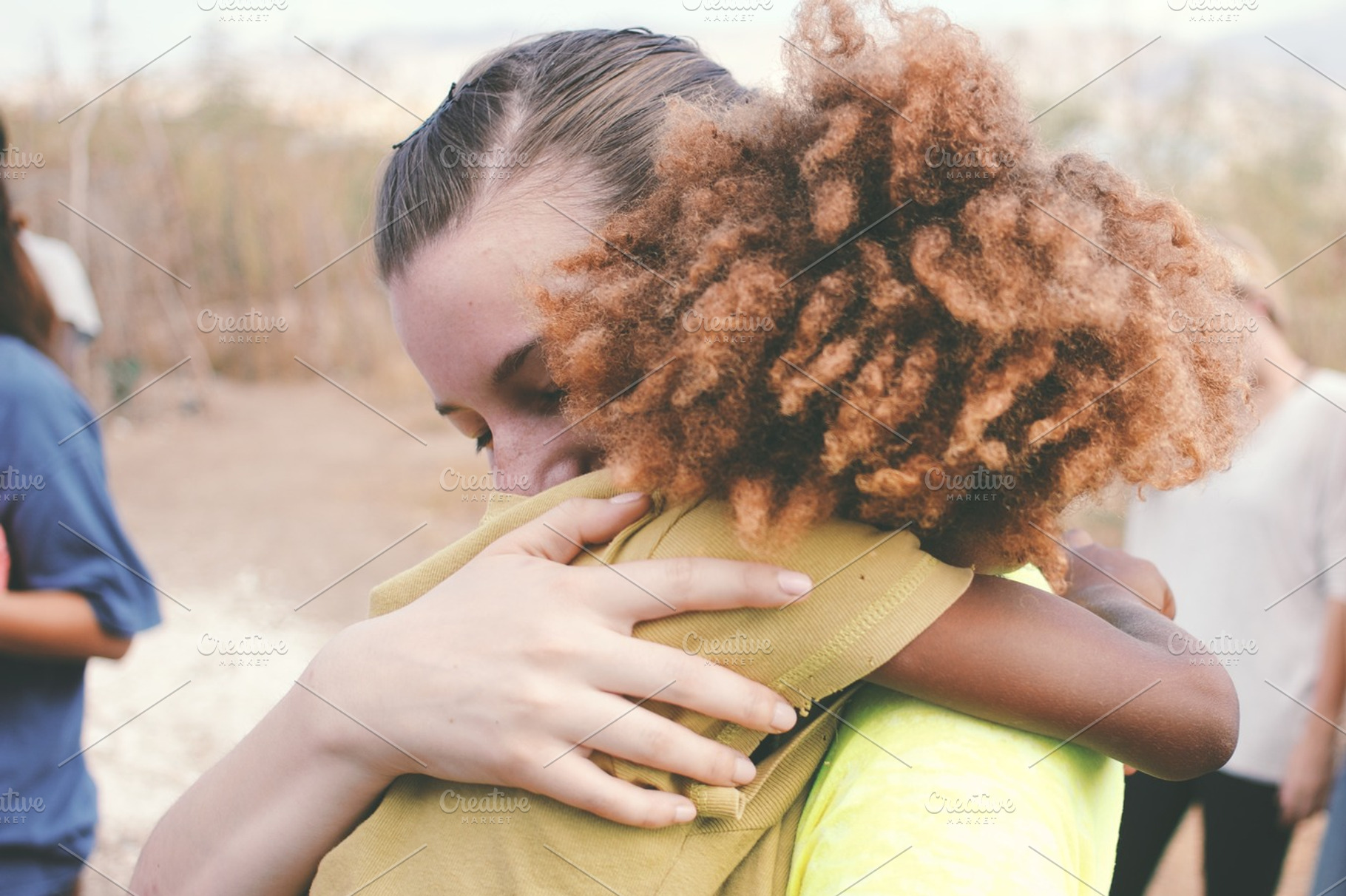 Goodbye hug containing mission trip, travel, and non-profit