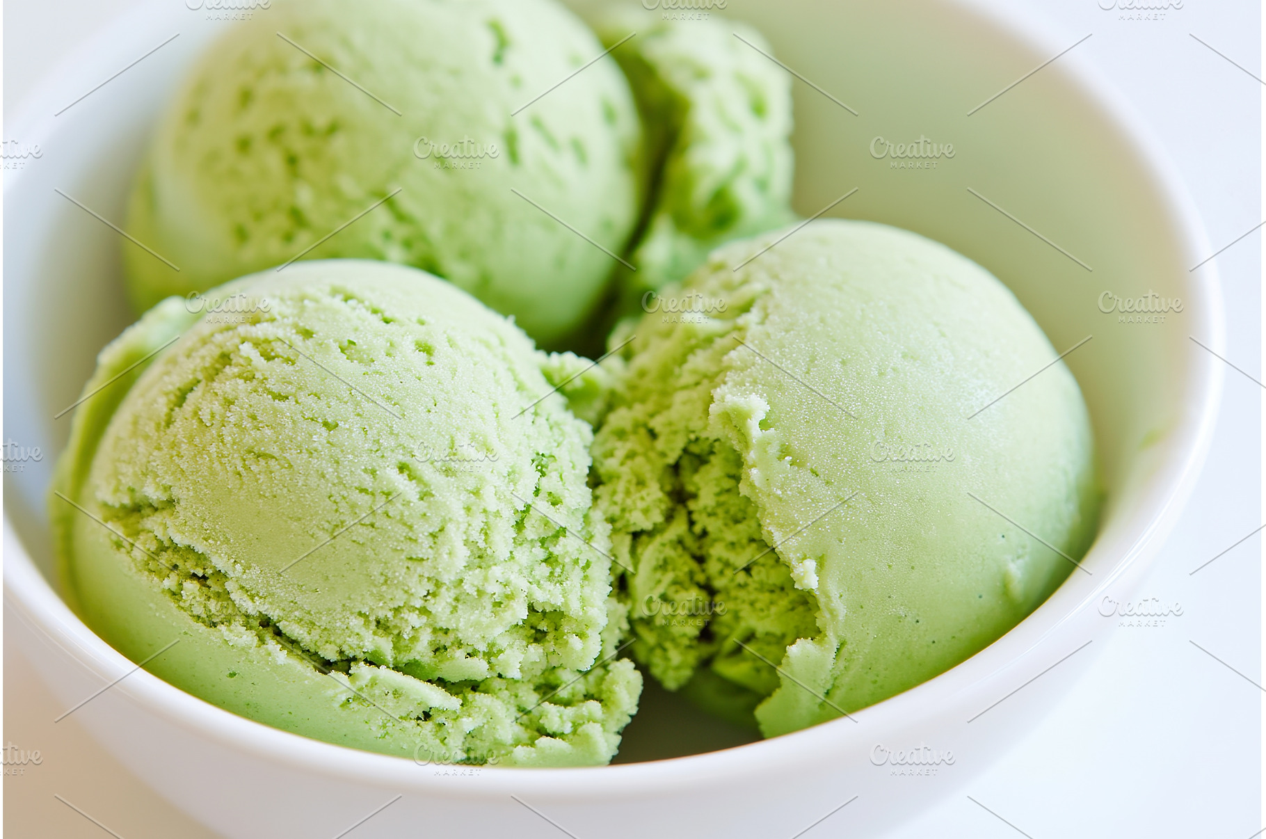 Green tea ice cream scoops in white, a Food & Drink Photo by Lermont51