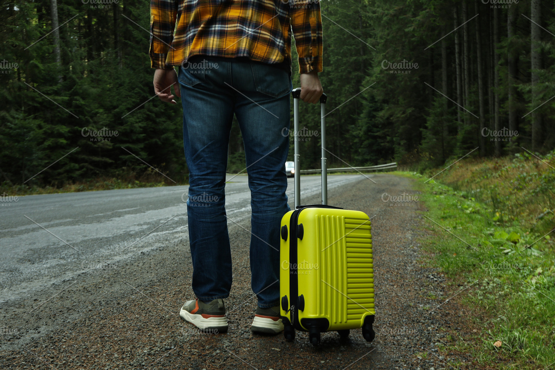 Adventure and tourism concept, young man traveling by auto stop, a Nature Photo by AtlasStudio PRO