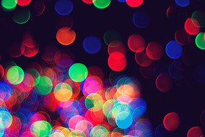 Holiday spirit containing bokeh, lights, and christmas