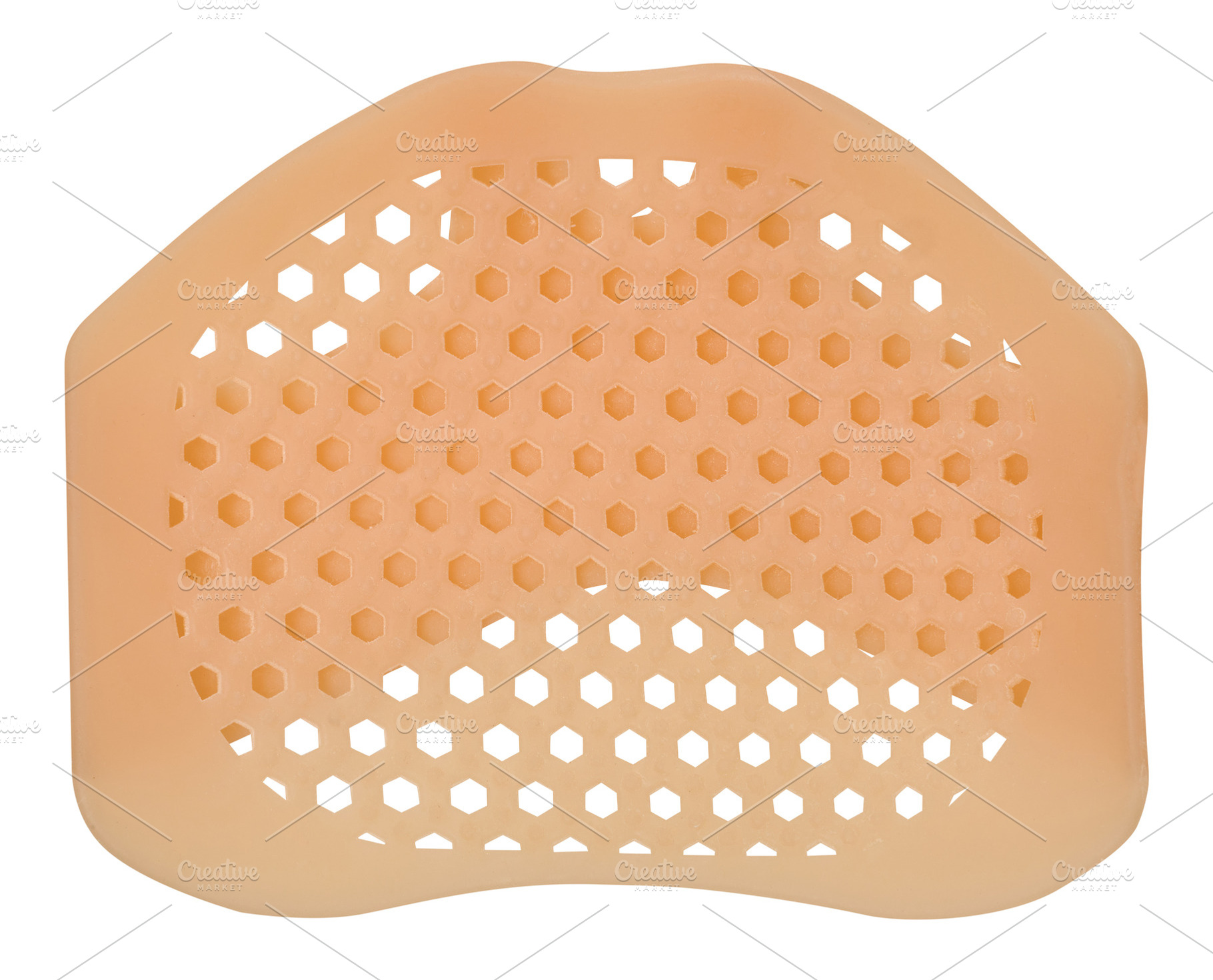 A beige silicone shoe liner on an isolated background featuring, a Health & Medical Photo by ndanko