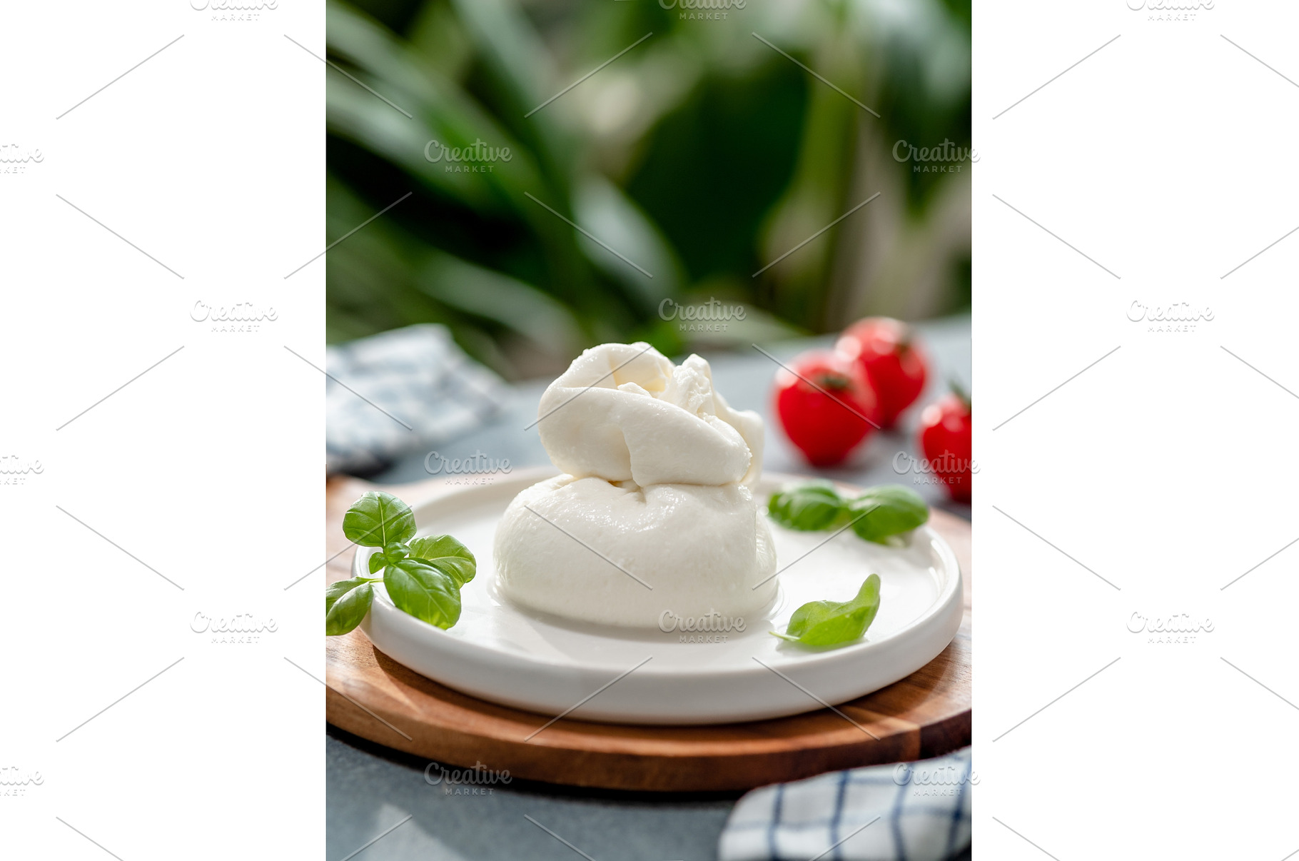 Burrata cheese on plate, copy space, a Food & Drink Photo by Fascinadora