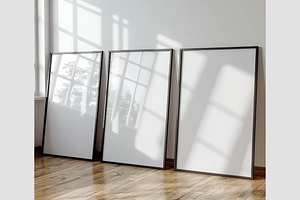 Three Frame Mockup Set in a Room, an Architecture Photo by GFXCity